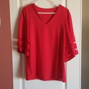 Bell sleeved top